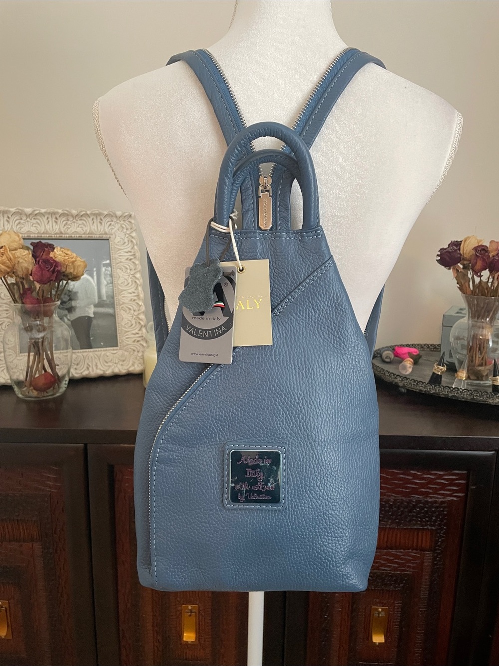 Valentina Italian pebbled leather convertible sling backpack